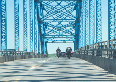 motorcycles on bridge