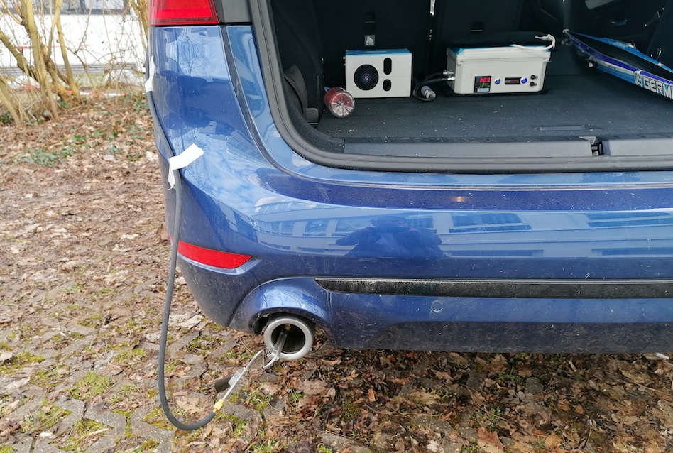 parSYNC probe inserted in tailpipe with equipment setup in rear cargo area